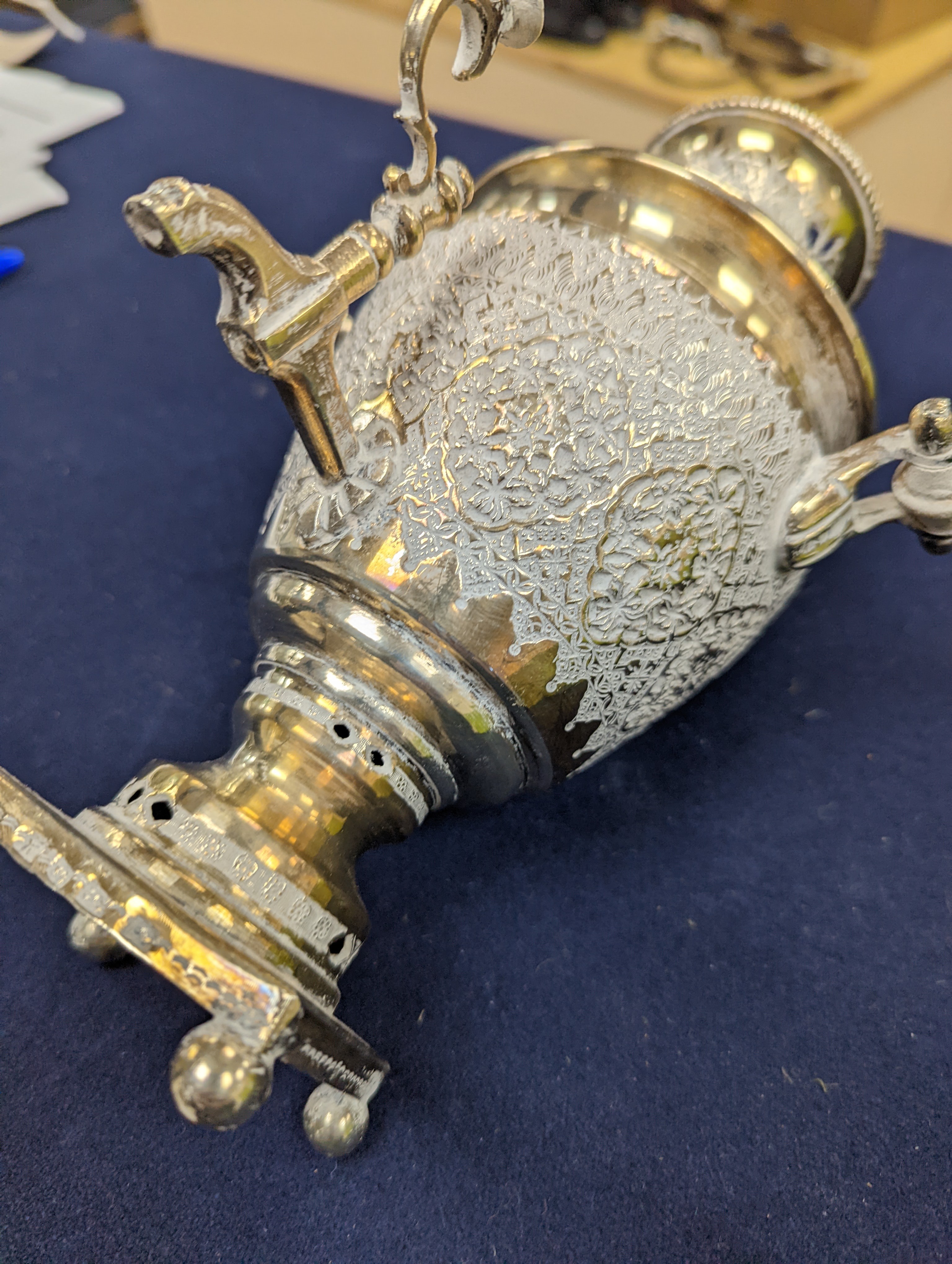 A set of six Persian embossed 84 standard white metal coffee cup holders and matching sugar bowl and cover by Vartan and four other Persian white metal items.